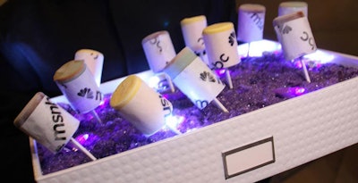 Occasions served push-up ice cream pops from glowing trays.