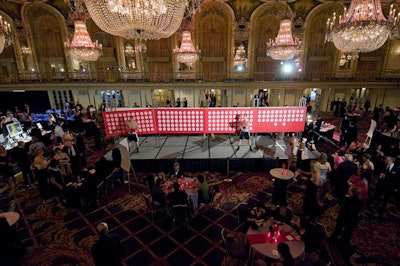 Guests bought $100 raffle tickets to win prizes from a punch board. The board had 400 numbered circles, and each circle had a corresponding prize valued at $100 or more.