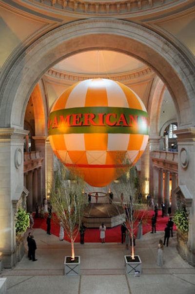 Rising from a leather-trimmed wicker basket in the center of the Great Hall and towering over the guests as they entered the museum was a 35- by 40-foot hot-air balloon. The piece was inspired by the Chicago World's Fair of 1893, an event that also informed the design of the panoramic exhibition galleries.