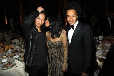 Gap creative director Patrick Robinson (right), whose company sponsored the gala and the exhibit, tapped past C.F.D.A./Vogue Fashion Fund Award winners like Alexander Wang (left) to design evening attire for guests like singer M.I.A. (center). The apparel will be available via auction starting May 5 and all proceeds will be donated to the Costume Institute.