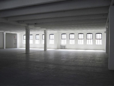 The venue's second, third, and fourth floors are raw, clutter-free spaces that measure 9,500 square feet and hold as many as 300 for receptions.