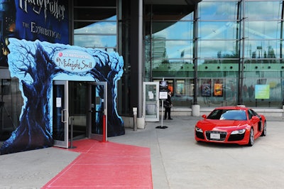 A cutout with the event logo and images of barren trees created a themed entrance to the Ontario Science Centre.