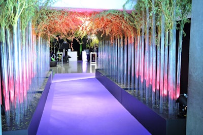 McNabb Roick Events filled a series of tall glass tubes that flanked either side of a purple carpet (a nod to event sponsor Telus) with greenery to create a forest-like canopy at the entrance to the cocktail reception.