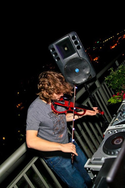DJ Manifesto performed on an electric violin.