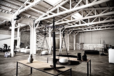 Exposed beams give the venue a raw, industrial look.