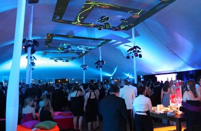 A trio of square chandeliers provided a whimsical touch to the reception tent.