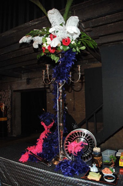 Stardust Events incorporated motorcycle parts into the floral arrangements.