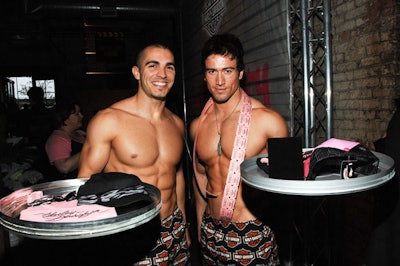 Male models from Surreal Productions, dressed in Harley-Davidson boxers, sold raffle tickets.