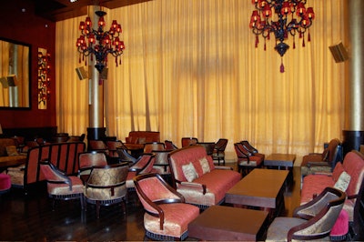 The 50-seat lounge has low chairs and sofas upholstered in paisley brocade.