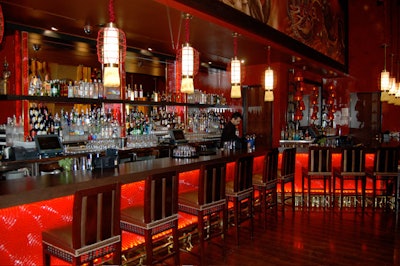 At the bar, bartenders pour more than 27 kinds of sake.
