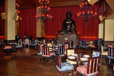 The 170-seat main dining room is dominated by an 18-foot-tall Buddha statue.