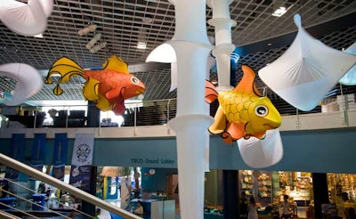 ConceptBait suspended four- by nine-foot spandex fish in the atrium to create the illusion of guests being in a fish tank with the other sea creatures.