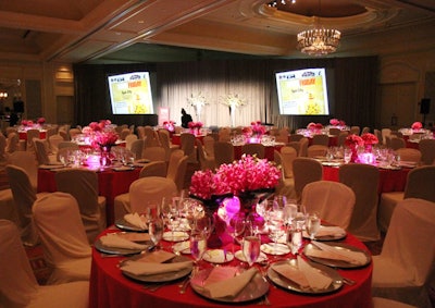 Pink and white decor and flowers decorated the ballroom for Tuesday's dinner.