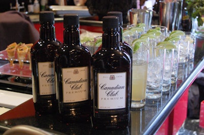 Bottles of Canadian Club topped the bar in the kitchen, which L-Eat Catering used as a prep area.