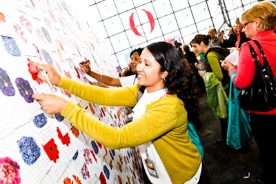 Attendees tacked messages onto the Inspiration Wall at the Javits Center.