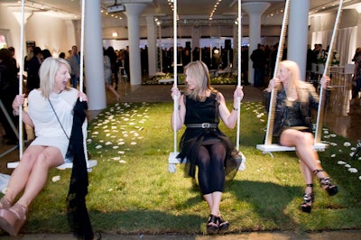 With a park theme, the cocktail reception offered an indoor swing and daisy-lined sod.
