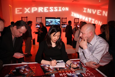 Another component of the partnership with Marvel and Iron Man 2 was a limited edition Iron Man comic book, which will also be given as a gift with purchase to LG consumers. LG Electronics field product trainer Brian Scollo (far right), used the promotional cartoon to show off the LG Ally's capabilities.