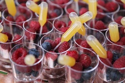 One of the four dessert options in Tomorrowland was fresh berries with a coulis in a pipette.