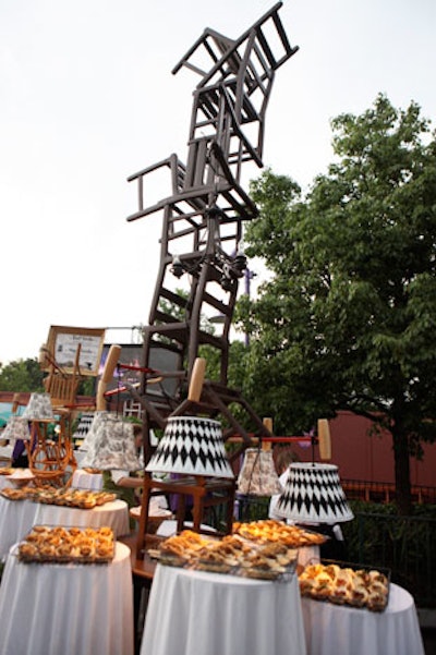 The design team used stacked chairs a la Alice in Wonderland to decorate the food stations near the story's ride.