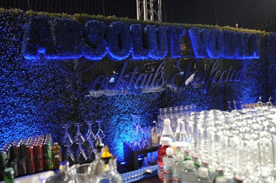 Flowers and hedging backed a bar from sponsor Absolut.