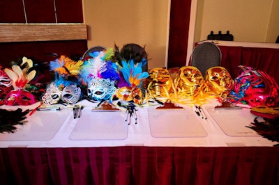 Staffers handed out masks to guests upon arrival at the masquerade-themed event.