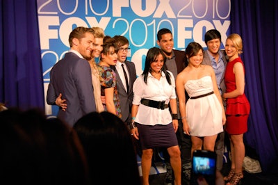 The cast of Glee stopped by two of the talent stations to pose with guests for souvenir photos.