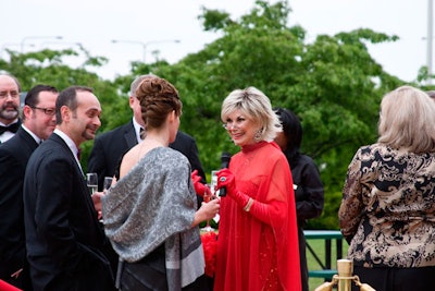 A mock Joan Rivers conducted interviews as guests arrived.