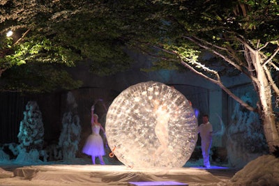 Entertainers circled the snow-filled courtyard in Zorbs, the symbol of the upcoming 2014 winter Olympics in Sochi, Russia.