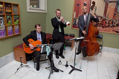 A three-piece ensemble played for guests during the pre-concert reception.