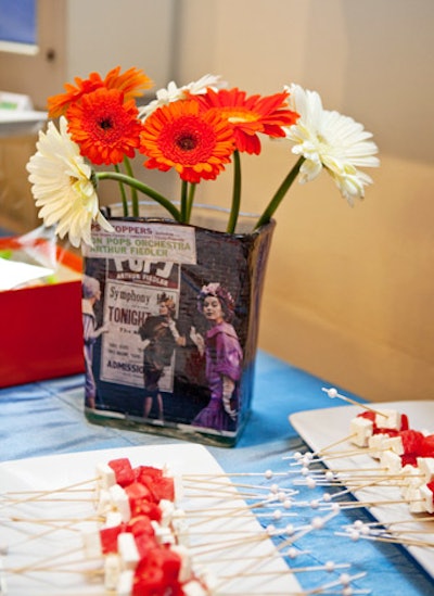 Decoupage vases on the buffet tables were a nod to vintage Pops album covers.
