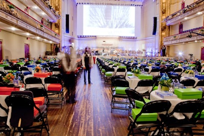 Guests watched the performance from tables in the audience.