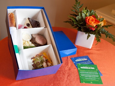 Boxed dinners by Boston Gourmet were at guests' seats before they arrived in the hall. The meal included shrimp, celery, and leek salad, beef tenderloin with smoky Vidalia onion dressing, and Yukon gold potato salad with lemon horseradish aioli.