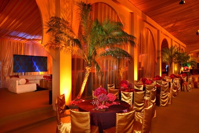 Potted palm trees accented rows of 24-inch tables that flanked the bars and buffets.
