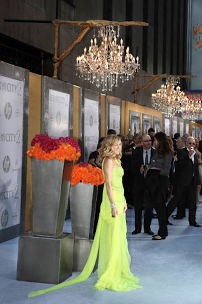 The film's stars walked the 400-foot blue carpeted step-and-repeat, where chandeliers hung overhead.