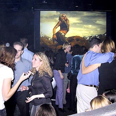 Images from the magazine were projected in the dark, basement venue.