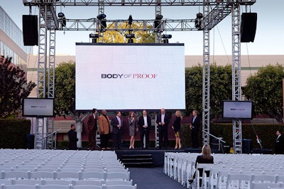 A 12- by 22-foot screen showed off the programming.
