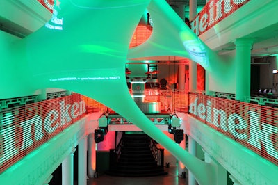 The beer company's logo decorated the railings of the building's atrium and central sculpture.