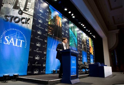SkyBridge Capital logos decked the stage and podium.