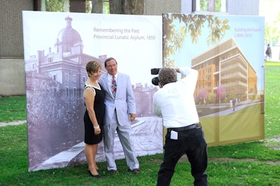 A stand-and-repeat featured images of the former facility, circa 1850, and plans for the new centre.