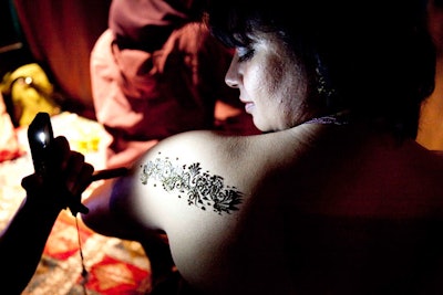Henna artists offered tattoos to guests in the Maharani Lounge at the after-party.
