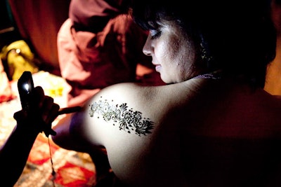 Henna artists offered tattoos to guests in the Maharani Lounge at the after-party.