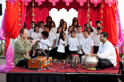 John McDowell, composer of the music in the film Born Into Brothels, performed a Hindi song with the Regent Park School of Music Children's Choir for V.I.P. guests on the patio at the Palais Royale.