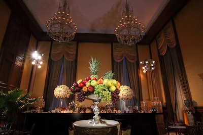 Fields & Chambers Floral Events created the large floral and fruit centerpieces that decorated the tearoom.