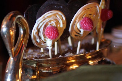 Handcrafted chocolate lace lollipops—available in white chocolate-raspberry, dark chocolate, fleur de sel, and milk chocolate-saffron—decorated the side tables in Palekh Hall, decorated to look like Tolstoy's library.