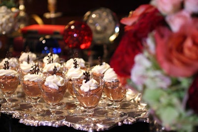 Cocktail glasses were used for more than drinks as Occasions Caterers filled tiny flutes with chocolate mousse.