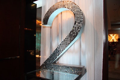 A sparkly 2 framed the entrance to the Park Hyatt Chicago's grand salon, where the after-party took place.