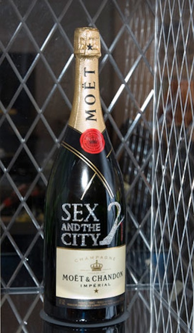 Hostesses received customized bottles of champagne.