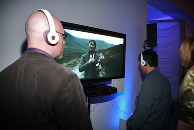 So as not to create a hubbub of noise, headphones were attached to each TV in the gallery, allowing guests to hear the music and sound. Ipods at one end played nominated campaigns.