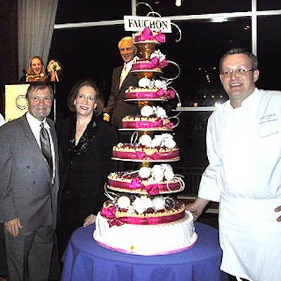 At the Careers Through Culinary Arts Program (C-CAP) benefit at Pier Sixty , Jacques Pepin (left), Bon Appetit editor in chief and event chair Barbara Fairchild and Fauchon pastry chef Florian Bellanger posed next to a surprise cake for Fairchild's birthday. C-CAP founder Richard Grausman stood in the background.