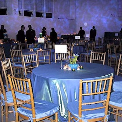 Frost Lighting used blue light and projections in the dining area inside the Mark Morris Dance Center in Brooklyn.